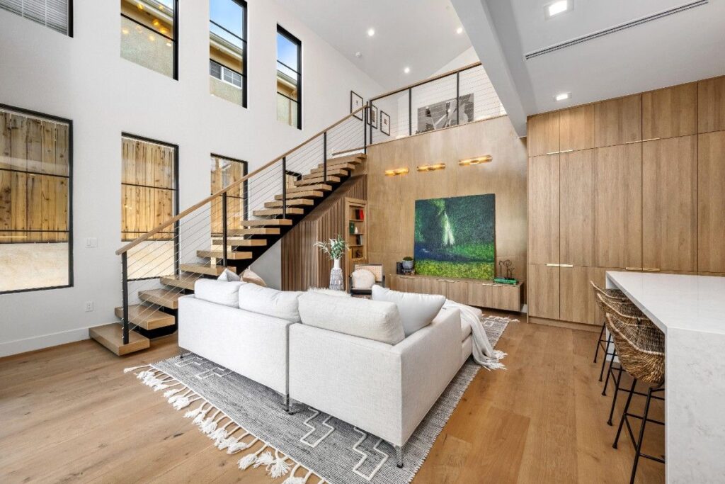 modern living room interior with a stylish stairca 2026 03 18 09 47 30 utc